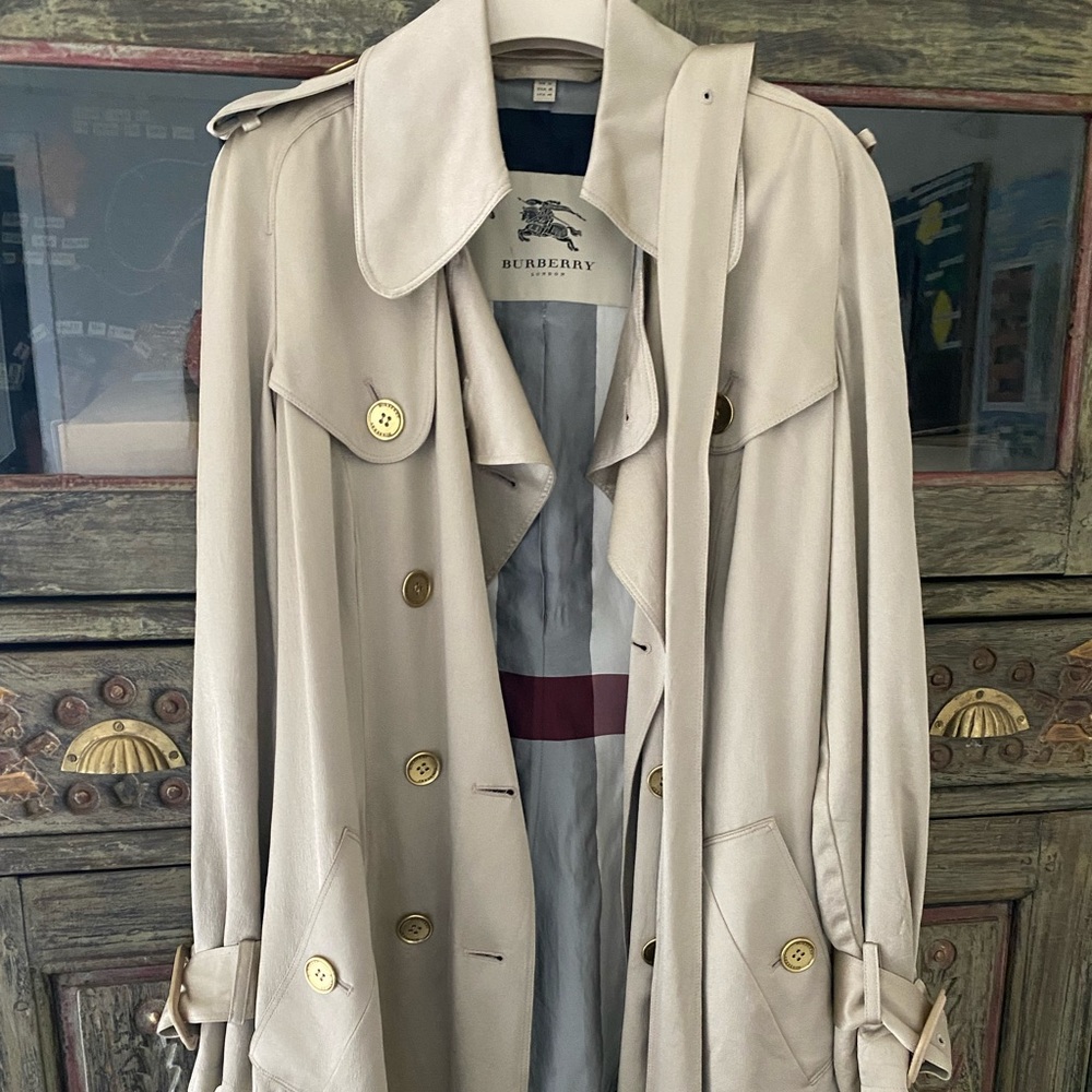 Authentic silk Burberry trench. Would best fit. 2-6 US. Perfect condition.